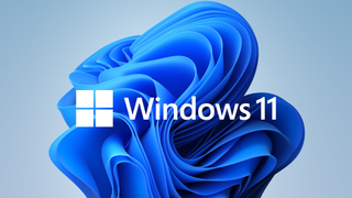 새 배경 화면 앞의 Windows 11 로고