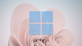 Windows에서 클립보드 기록을 활성화하는 방법에 대한 기사를 나타내는 파란색 Windows 11 로고가 겹쳐진 Windows 11 배경 화면